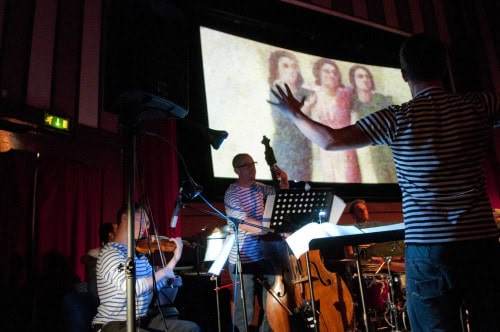 Dave Kane conducting for Salt Song (1) at Hyde Park Picture House 5 September 2013. Photo by Lizzie Coombes for Imove.