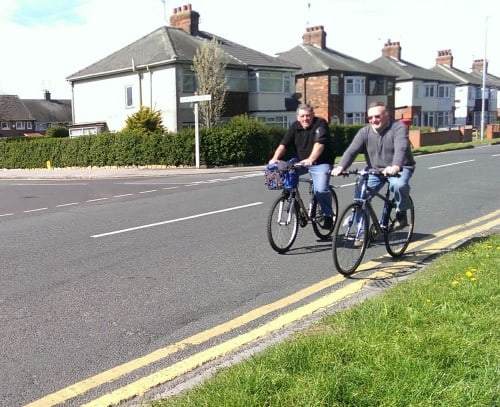 2 men cycling