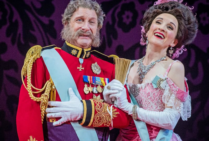 Geoffrey Dolton as Baron Zeta and Amy Freston as Valencienne in Opera North’s The Merry Widow [Photo credit: Robert Workman]