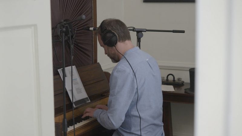 Adrian at work on Emily's rare five-octave cabinet piano.  Courtesy of The Unthanks.