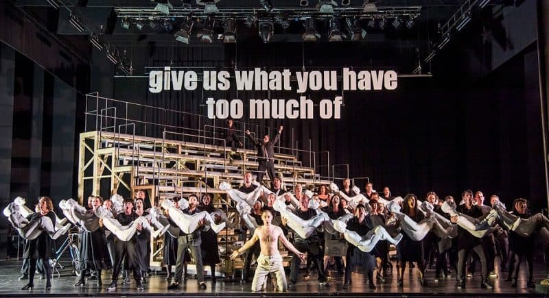 John Savournin as Priest Fotis (front) and Paul Nilon as Yannakos (back) with the Chorus of Opera North, The Greek Passion © Tristram Kenton